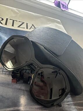 Prada Black Oversized Round Sunglasses with Textured Case